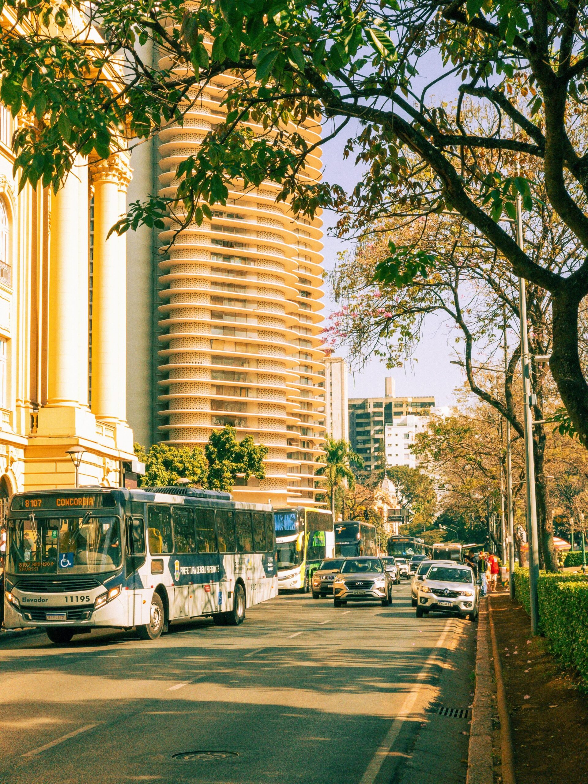 Vibrant street in Belo Horizonte, Brazil featuring distinctive architecture and city traffic.